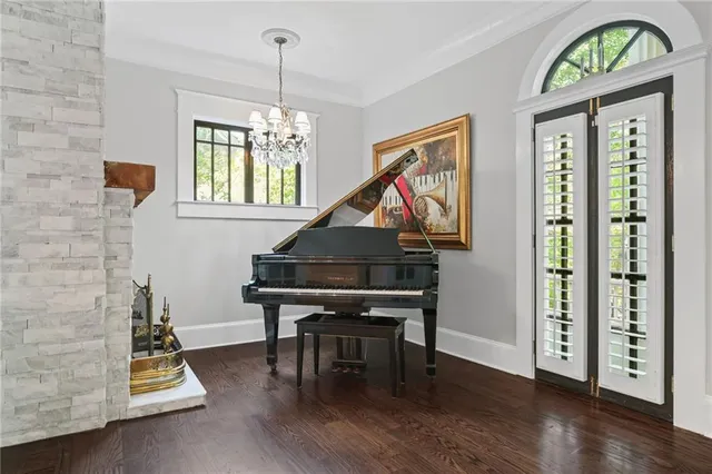 a view of an entryway with wooden floor