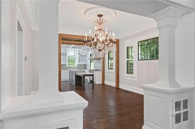 a kitchen with stainless steel appliances granite countertop a stove and cabinets