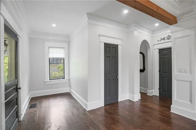 a bathroom with a double vanity sink mirror and shower