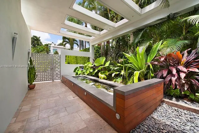 a view of a potted plants in front of a building