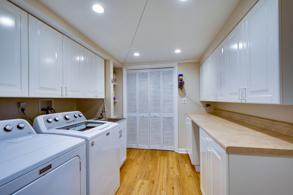 14 Highgate Street Needham, MA 02492 - Photo 24 of 27 a kitchen that has a sink and a stove