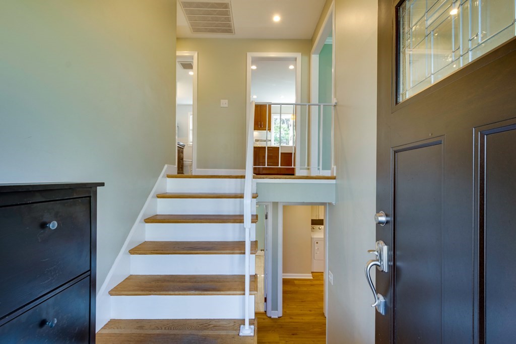 14 Highgate Street Needham, MA 02492 - Photo 3 of 27 a view of an entryway with wooden floor and windows
