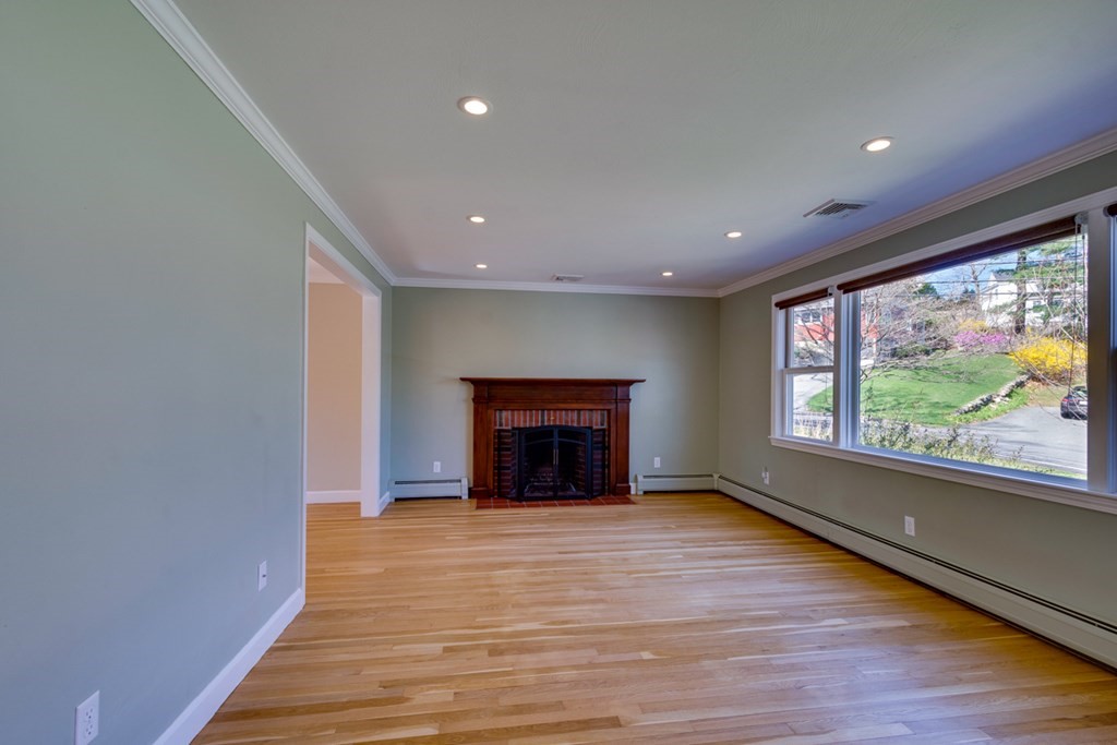 14 Highgate Street Needham, MA 02492 - Photo 5 of 27 wooden floor in an empty room with a window