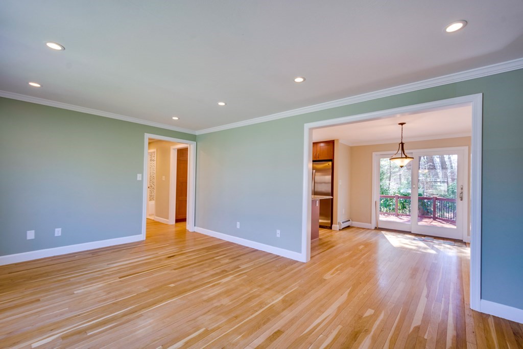 14 Highgate Street Needham, MA 02492 - Photo 7 of 27 a view of an empty room with wooden floor and a window