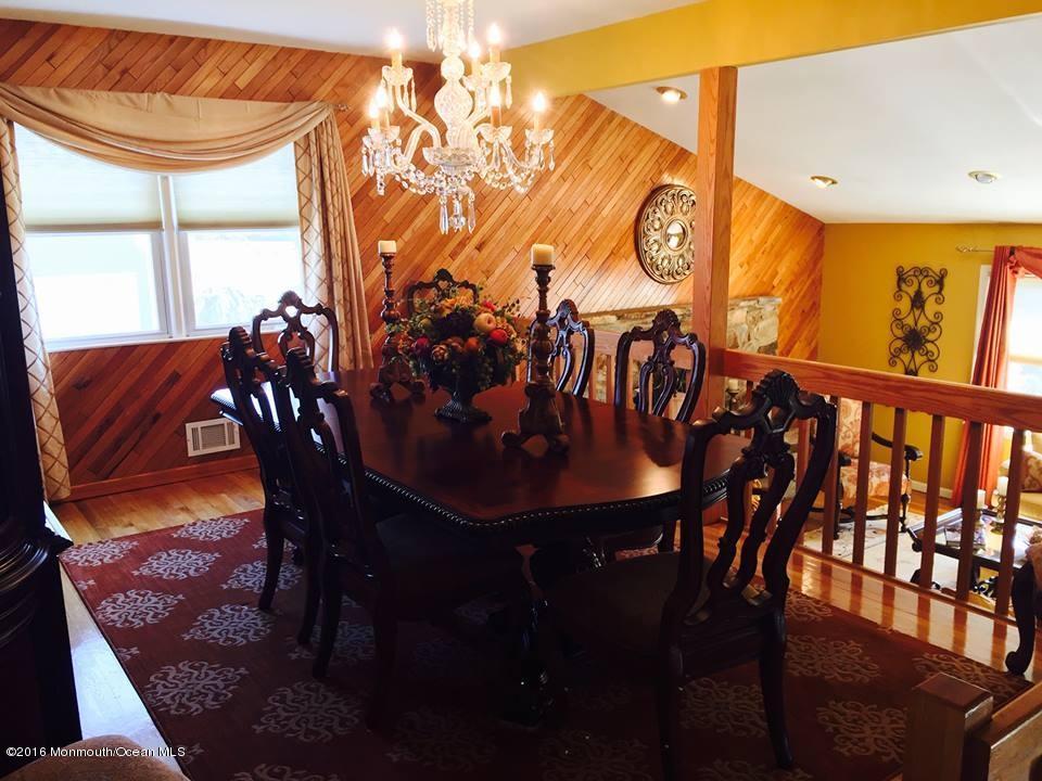 146 Old Post Road Freehold, NJ 07728 - Photo 5 of 15 a view of a dining room with furniture and window