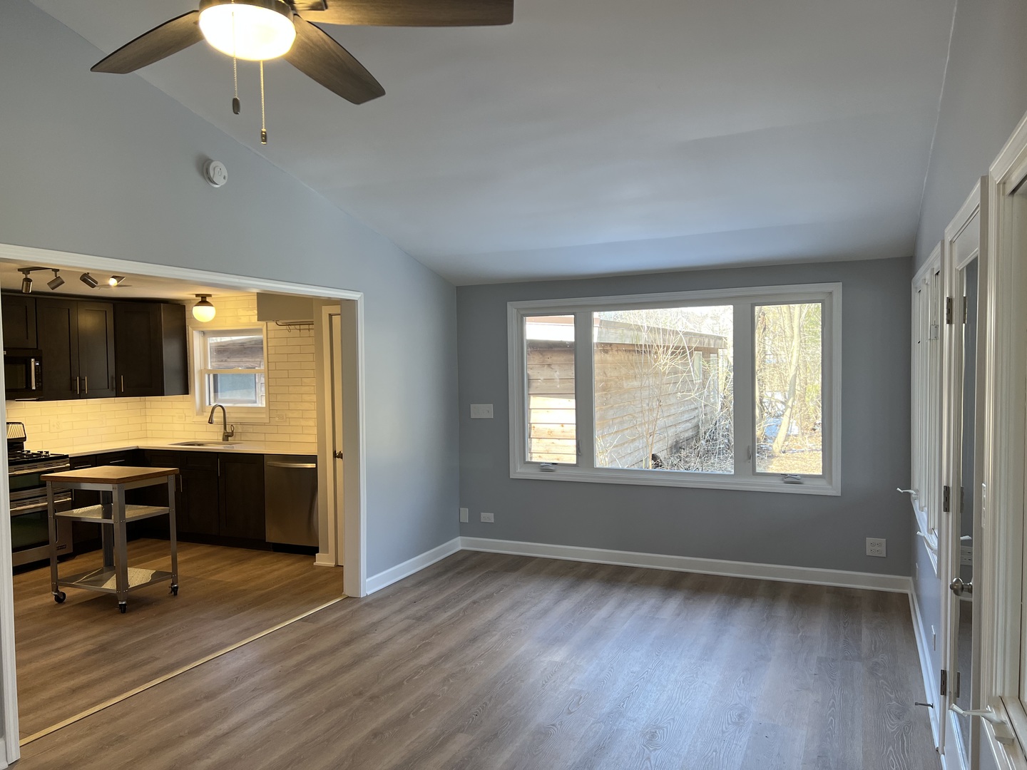 5S511 Radcliff Road Naperville, IL 60563 - Photo 5 of 13 a view of a workspace with furniture and a window