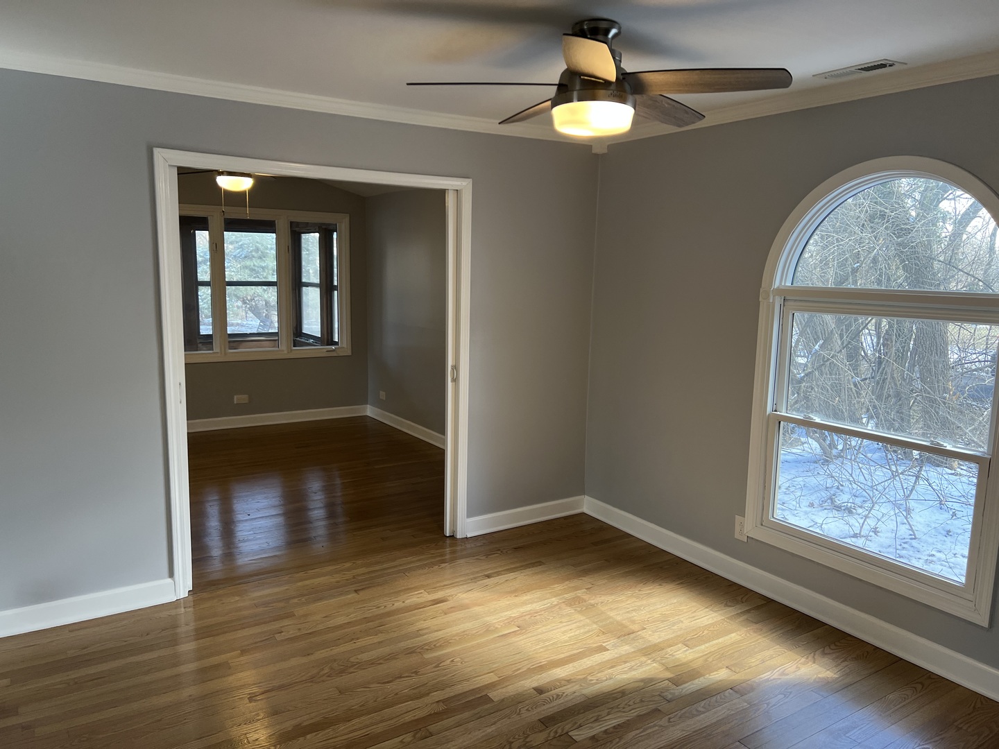 5S511 Radcliff Road Naperville, IL 60563 - Photo 8 of 13 wooden floor in an empty room with a window