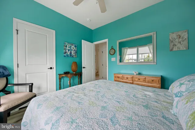 a view of a livingroom with furniture and a flat screen tv