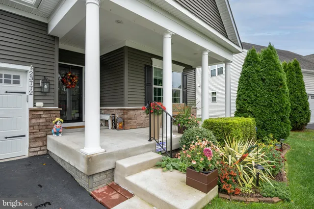 a view of balcony with furniture and wooden deck
