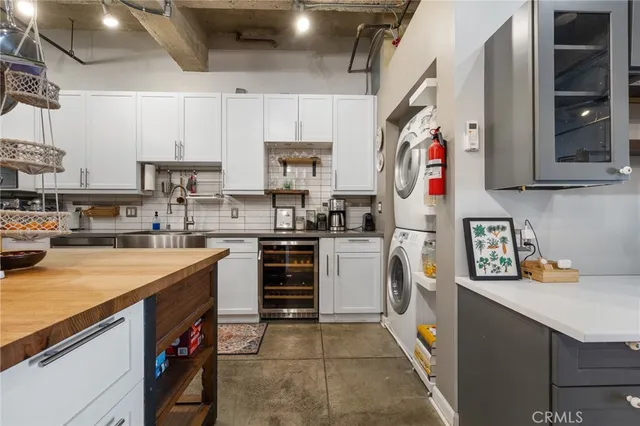 a kitchen with lots of appliances and cabinets