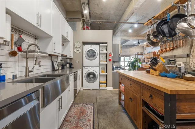 a view of a kitchen and utility room