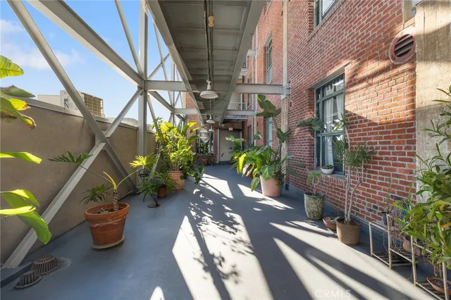 a view of a livingroom with furniture and a rug