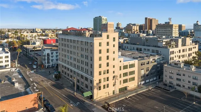 a view of parking garage with cars