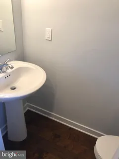 a bathroom with a sink and a toilet