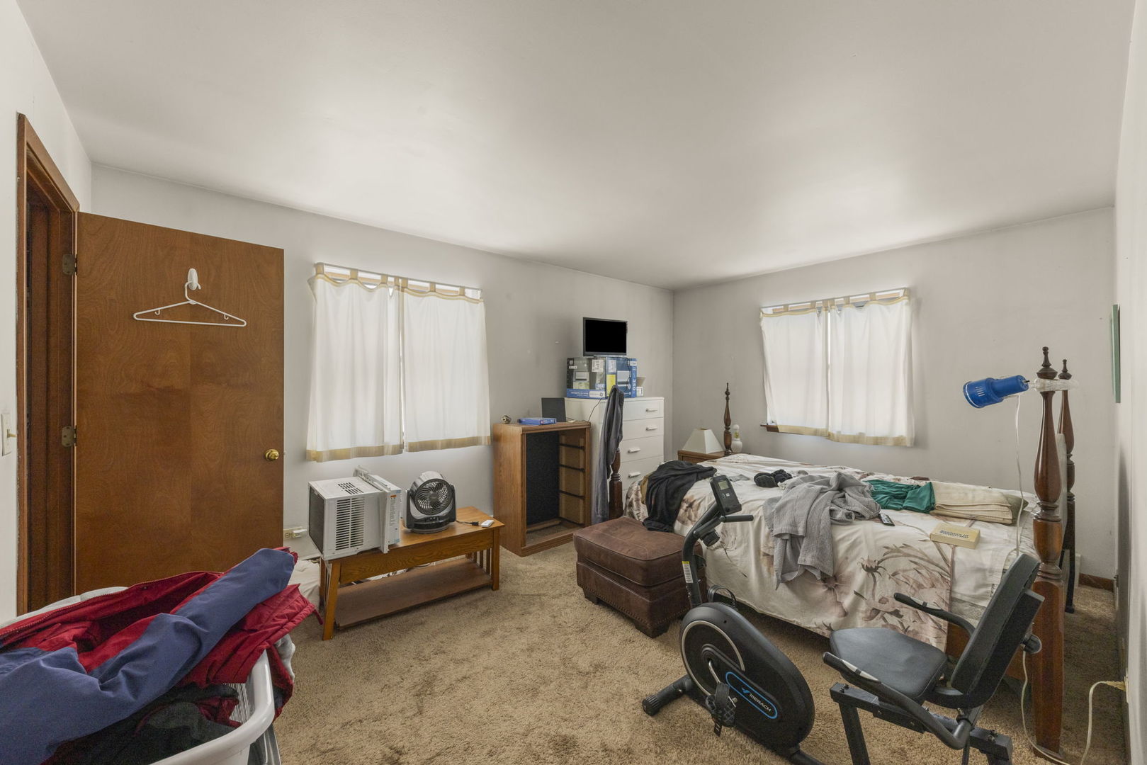 5700 St Charles Road Berkeley, IL 60163 - Photo 11 of 17 a bed room with furniture and a window