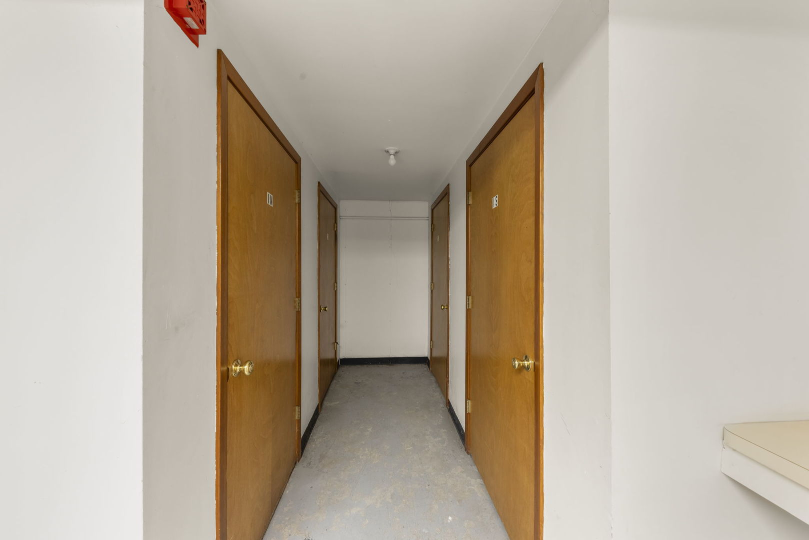 5700 St Charles Road Berkeley, IL 60163 - Photo 17 of 17 a view of a hallway with a bathroom