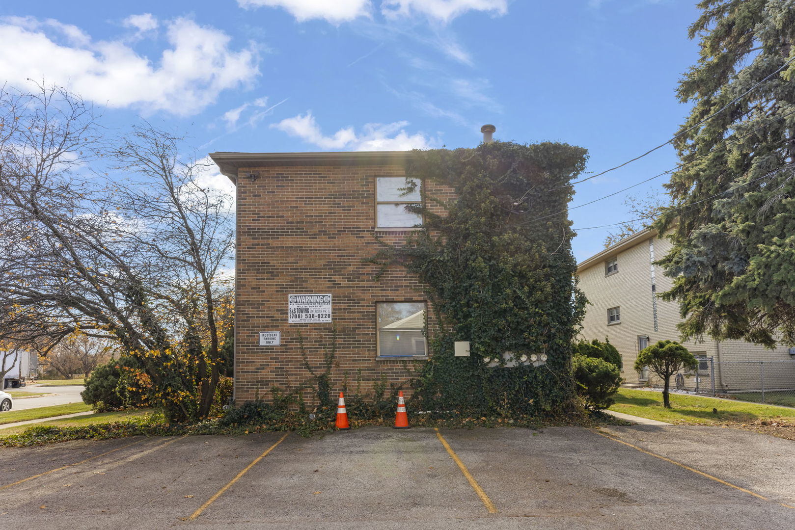 5700 St Charles Road Berkeley, IL 60163 - Photo 3 of 17 a view of a brick building next to a yard