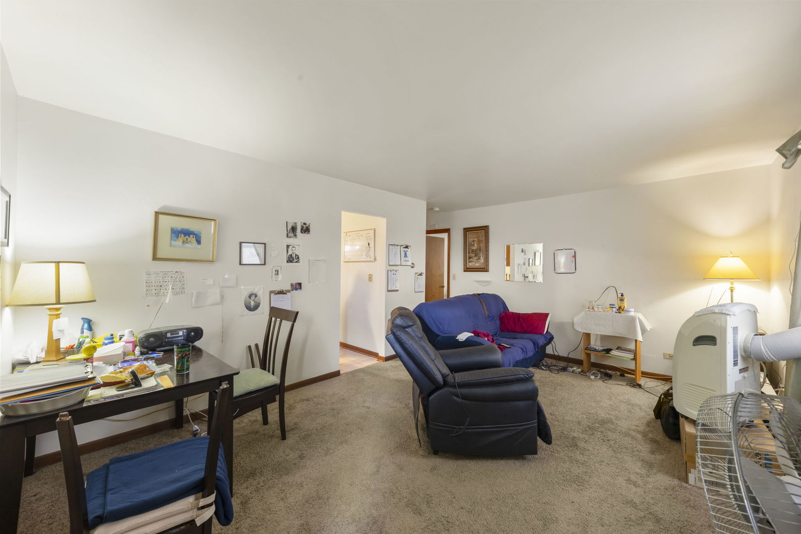 5700 St Charles Road Berkeley, IL 60163 - Photo 8 of 17 a living room with furniture