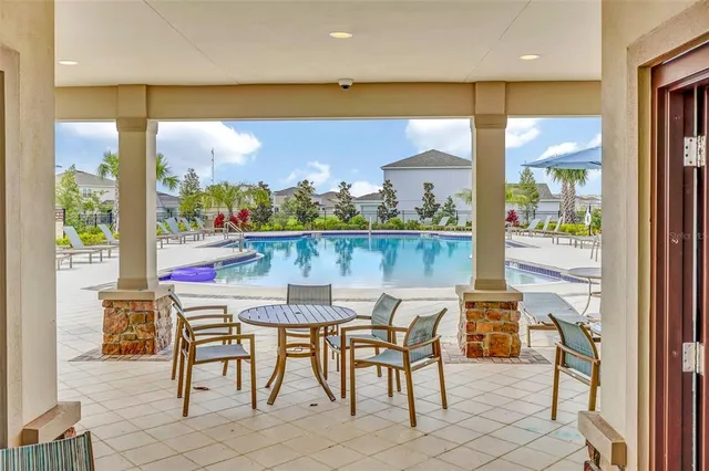 a view of a chairs and table in the terrace