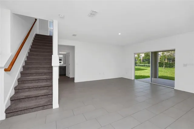 a view of an entryway with stairs
