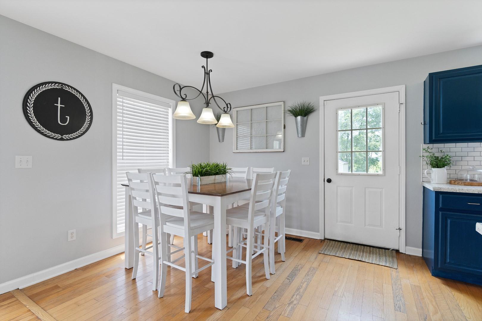 2225 Alvin Head Road Springfield, TN 37172 - Photo 12 of 24 a view of a dining room with furniture wooden floor and chandelier