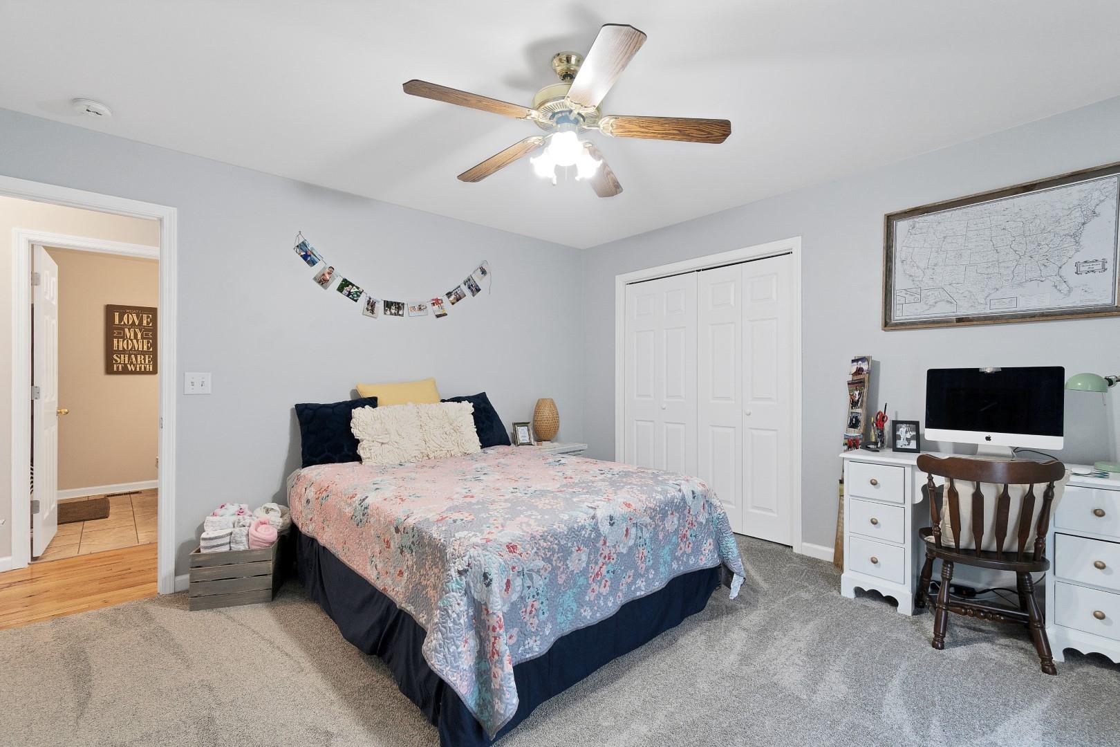 2225 Alvin Head Road Springfield, TN 37172 - Photo 22 of 24 a bedroom with a bed and a flat screen tv