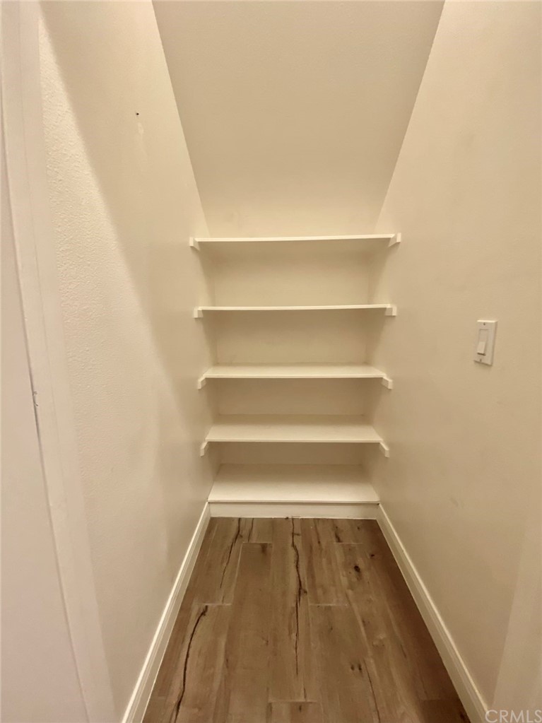 181 Rhapsody Irvine, CA 92620 - Photo 33 of 73 a view of a room with shelf