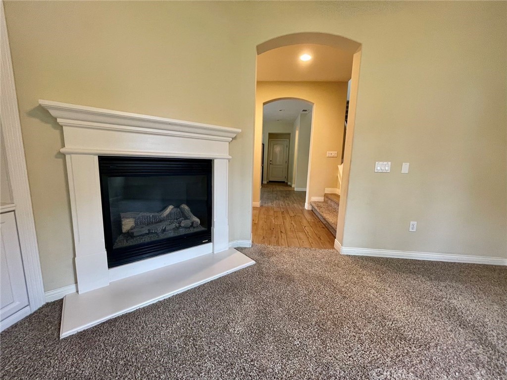 181 Rhapsody Irvine, CA 92620 - Photo 41 of 73 a view of an empty room with a fireplace