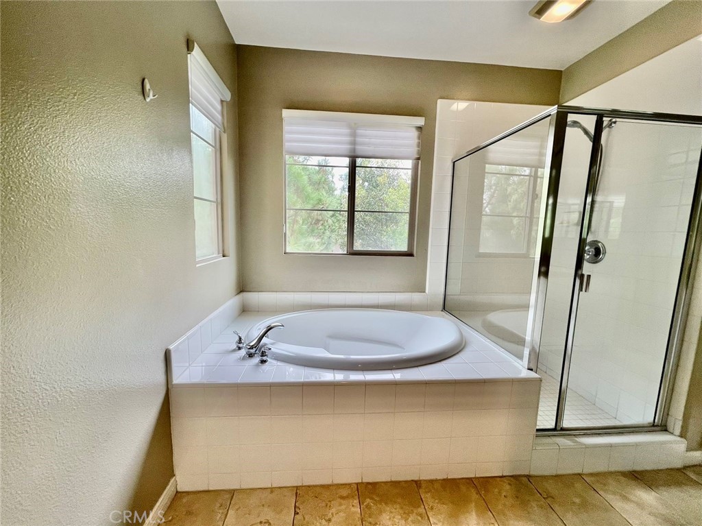 181 Rhapsody Irvine, CA 92620 - Photo 48 of 73 a bathroom with a granite countertop sink and a mirror