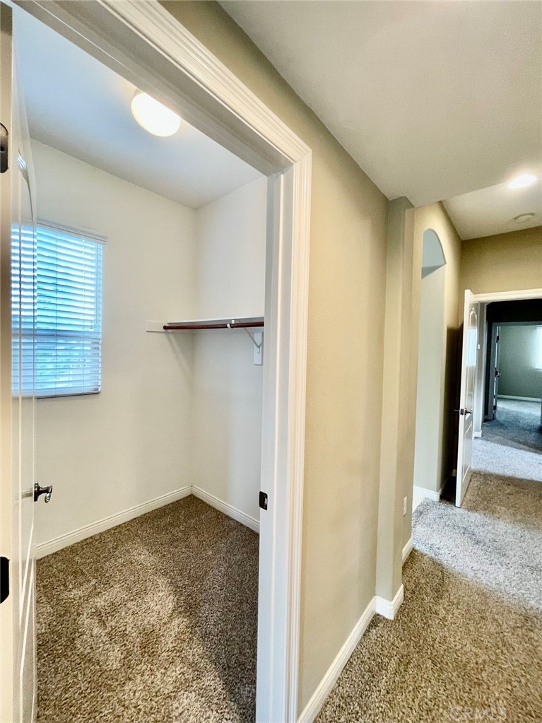 181 Rhapsody Irvine, CA 92620 - Photo 56 of 73 a view of a room that has a lot of cabinets and wooden floor