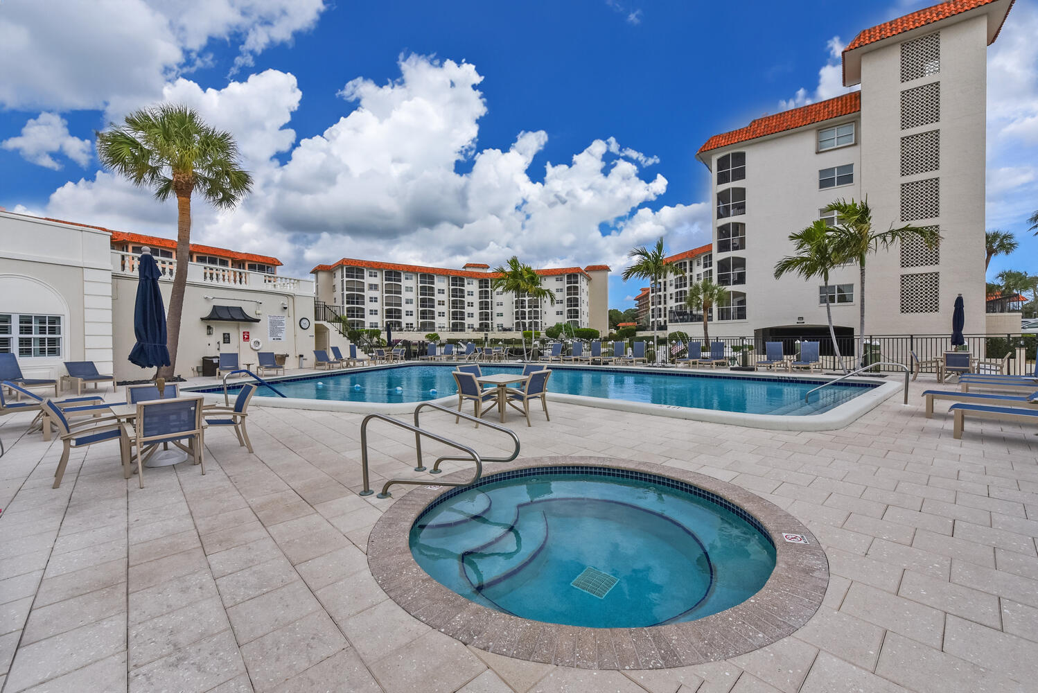 2871 North Ocean Boulevard, Unit F429 Boca Raton, FL 33431 - Photo 22 of 38 a view of a swimming pool with outdoor seating