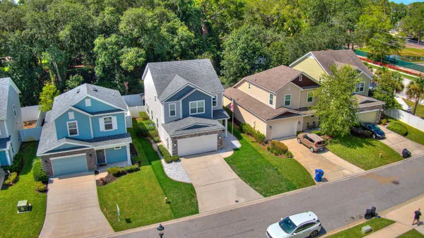 an aerial view of a house with a garden