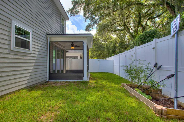 an aerial view of a house with outdoor space