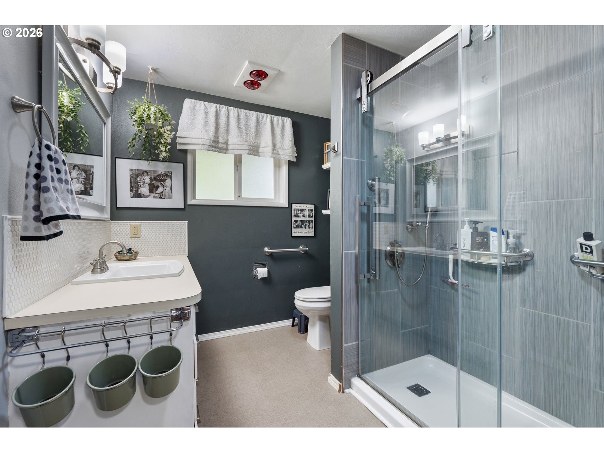 2936 Game Farm Road Springfield, OR 97477 - Photo 14 of 25 a bathroom with a sink a toilet a mirror and shower