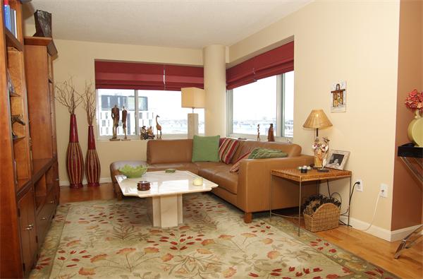 8 Museum Way, Unit 802 Cambridge, MA 02141 - Photo 2 of 13 a living room with furniture and a window