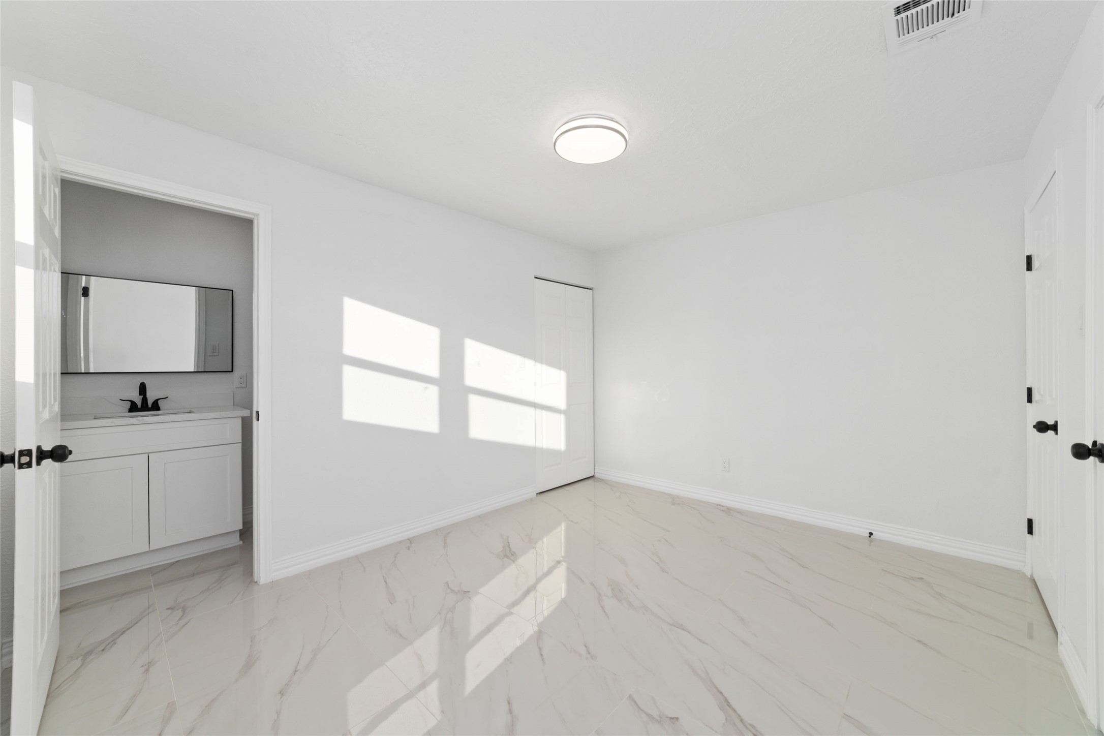 11434 Sharpview Drive Houston, TX 77072 - Photo 22 of 25 a view of an empty room and window