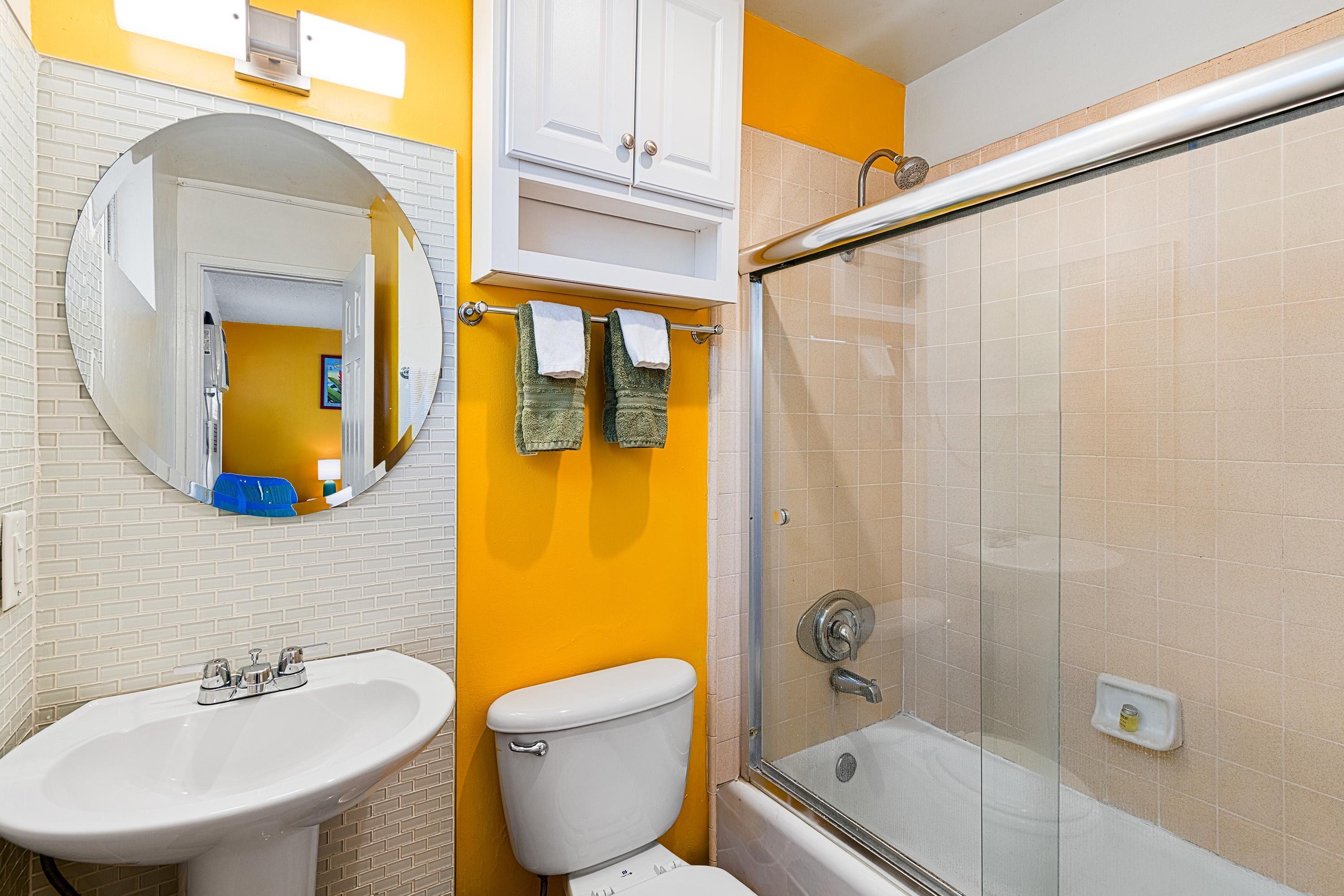 66665 First Street Desert Hot Springs, CA 92240 - Photo 21 of 35 a bathroom with a sink a toilet and shower