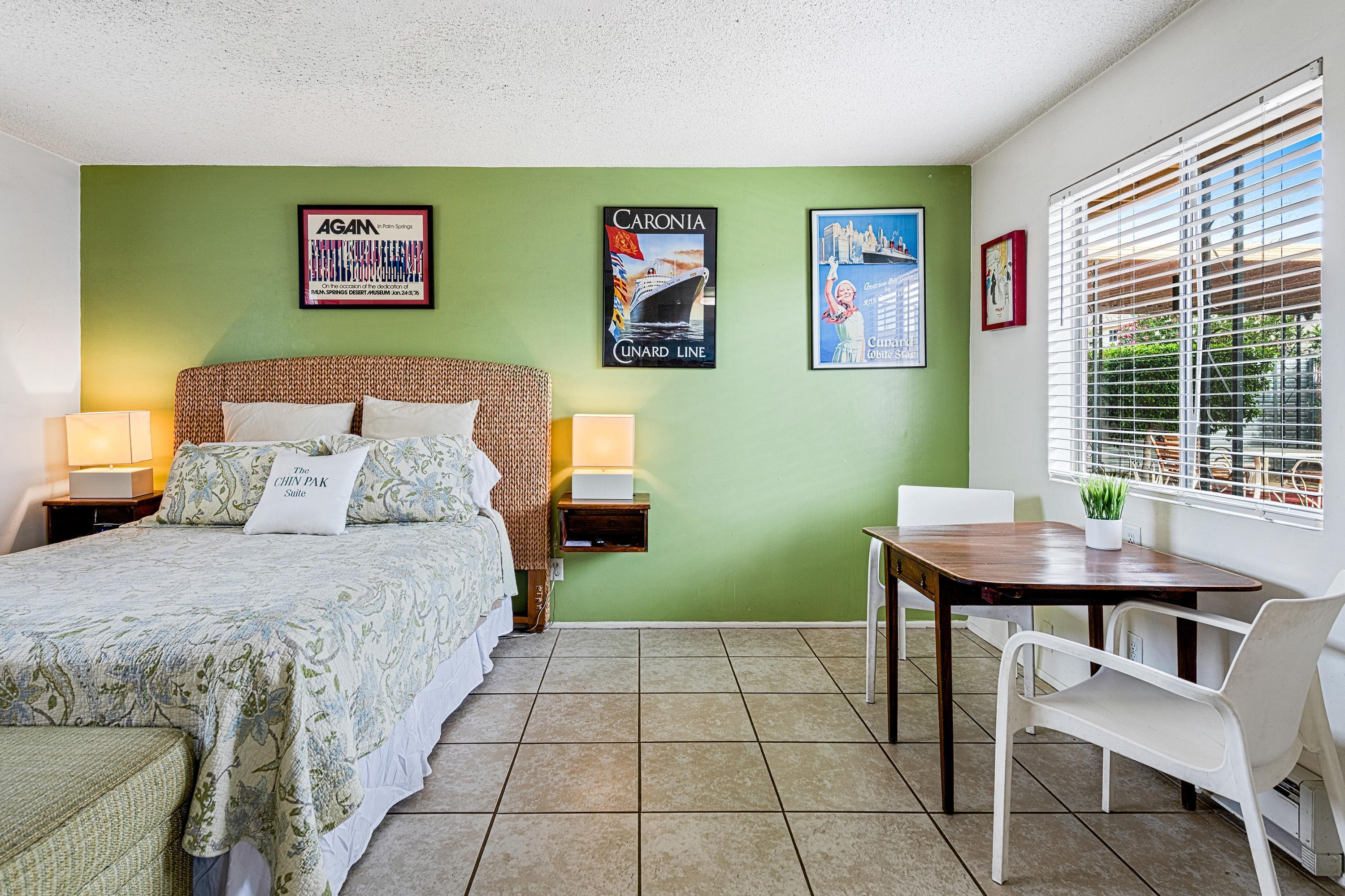 66665 First Street Desert Hot Springs, CA 92240 - Photo 22 of 35 a bedroom with a bed and a table in it