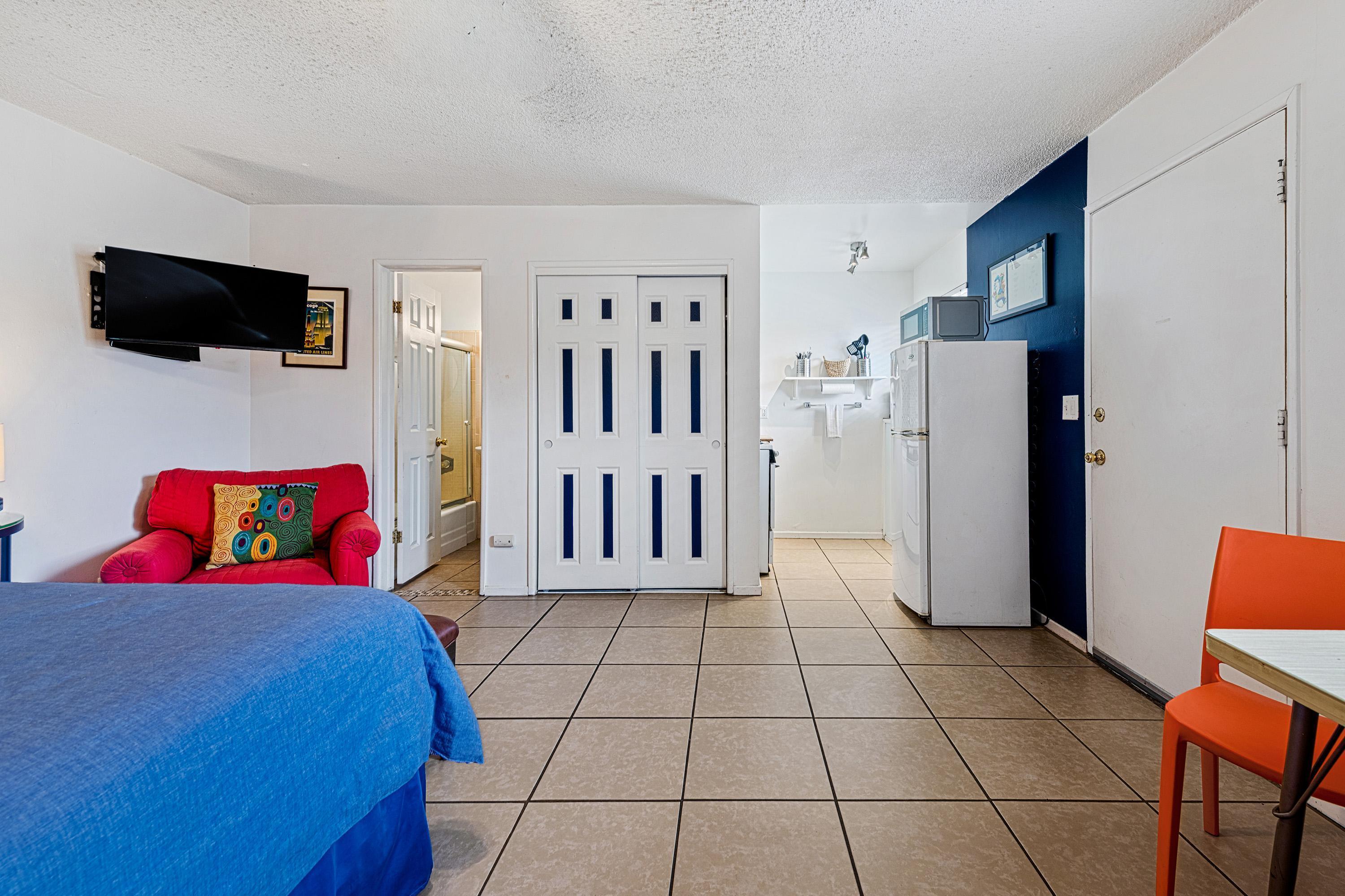 66665 First Street Desert Hot Springs, CA 92240 - Photo 27 of 35 a living room with furniture and a flat screen tv