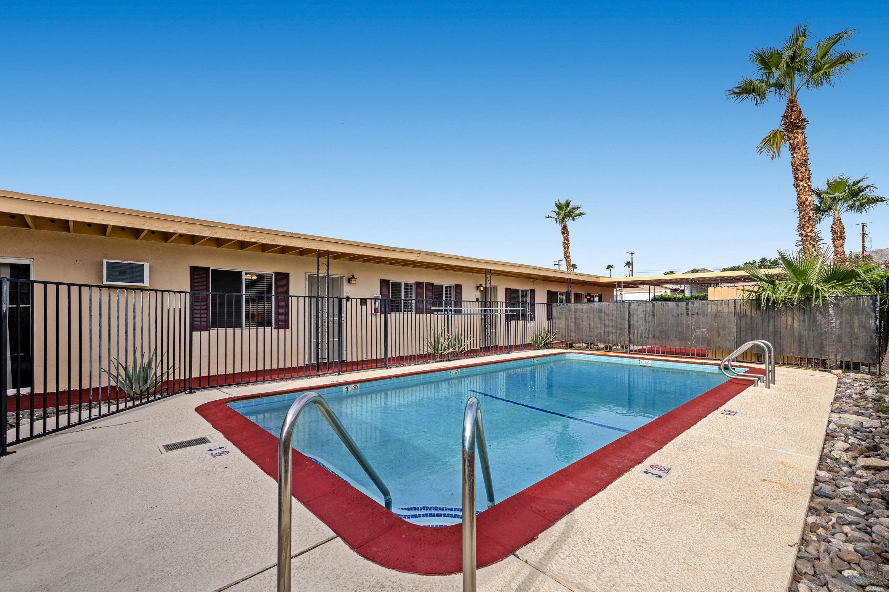66665 First Street Desert Hot Springs, CA 92240 - Photo 4 of 35 a view of a house with pool