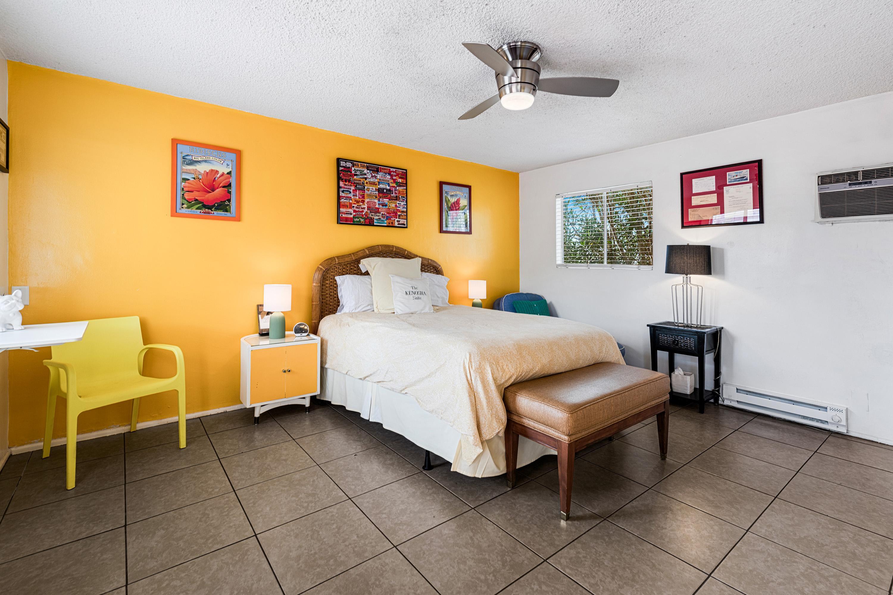 66665 First Street Desert Hot Springs, CA 92240 - Photo 5 of 35 a bedroom with a bed and a chair