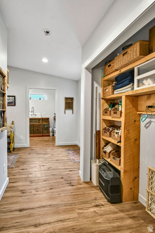 544 East 600 North, Unit 1 Joseph, UT 84739 - Photo 23 of 65 Hallway featuring wood-finish flooring, white baseboards, and light gray walls