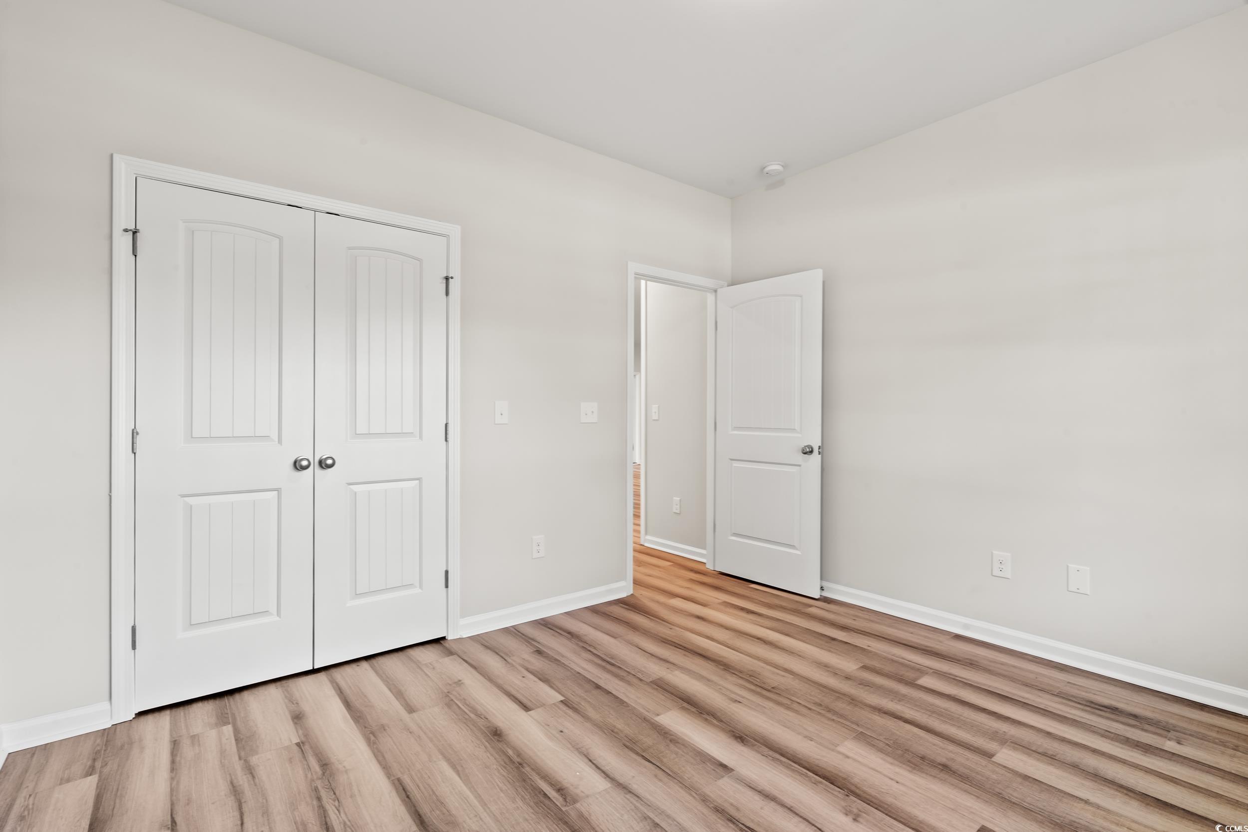 2315 Withers Street Georgetown, SC 29440 - Photo 15 of 29 Unfurnished bedroom with a closet and light wood-type flooring