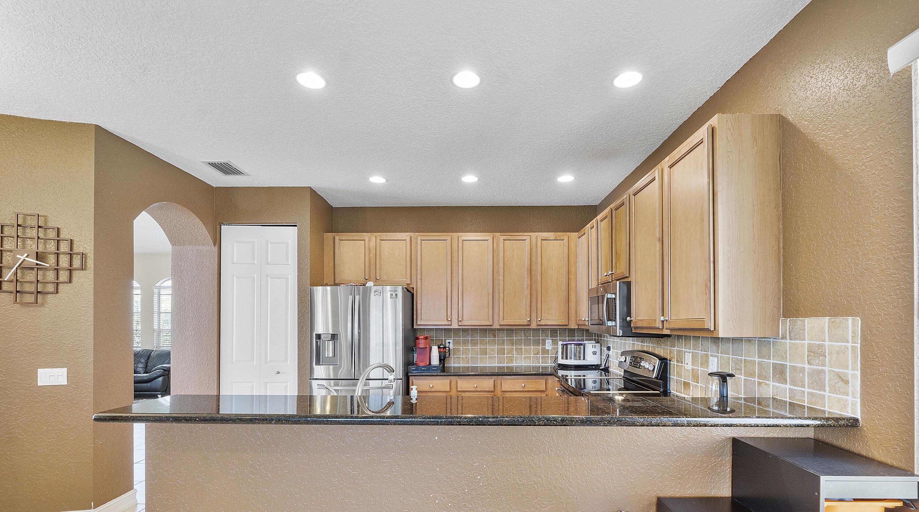 8936 Chestnut Ridge Way Boynton Beach, FL 33473 - Photo 14 of 50 kitchen 3