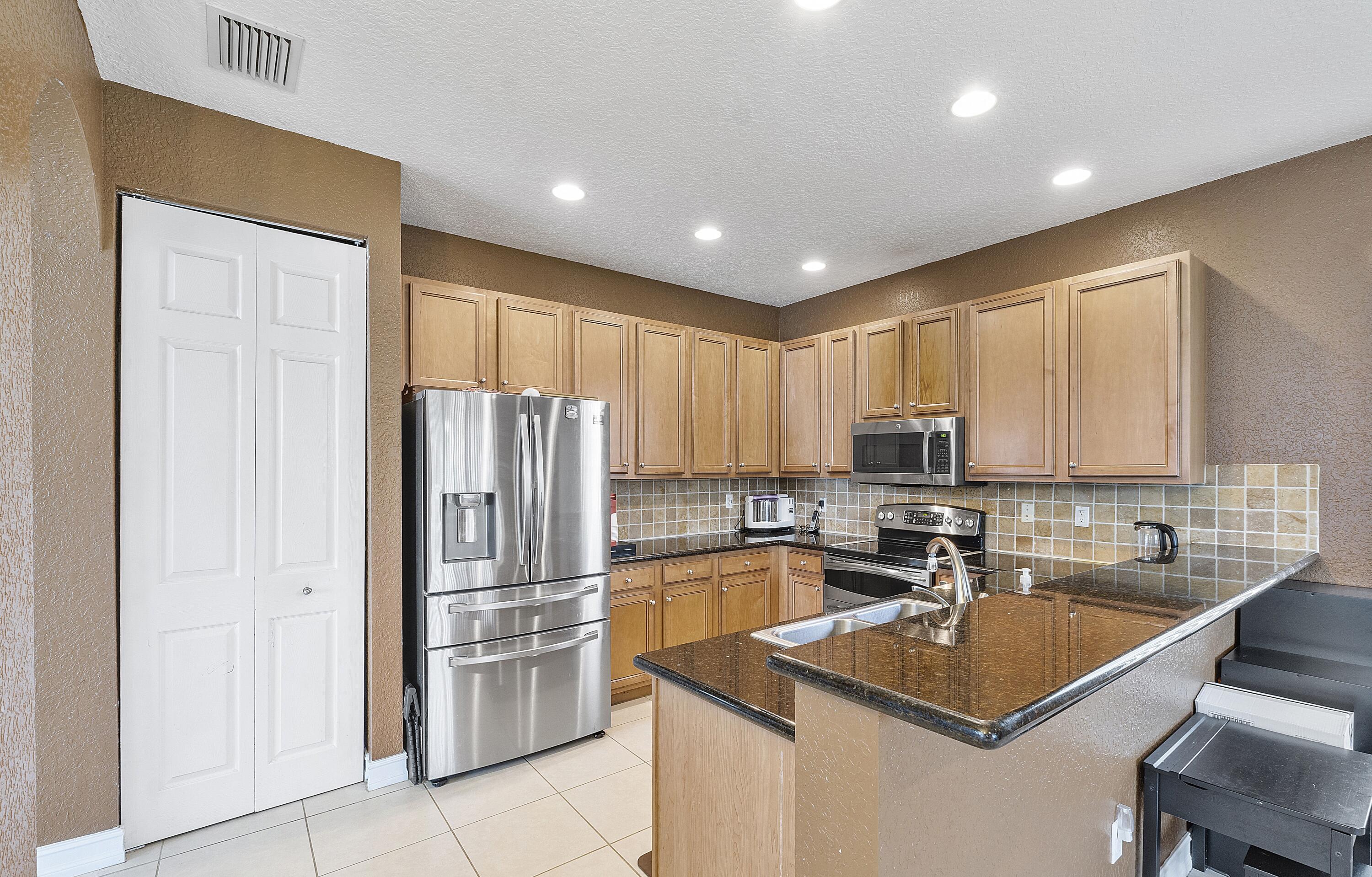 8936 Chestnut Ridge Way Boynton Beach, FL 33473 - Photo 17 of 50 kitchen 2