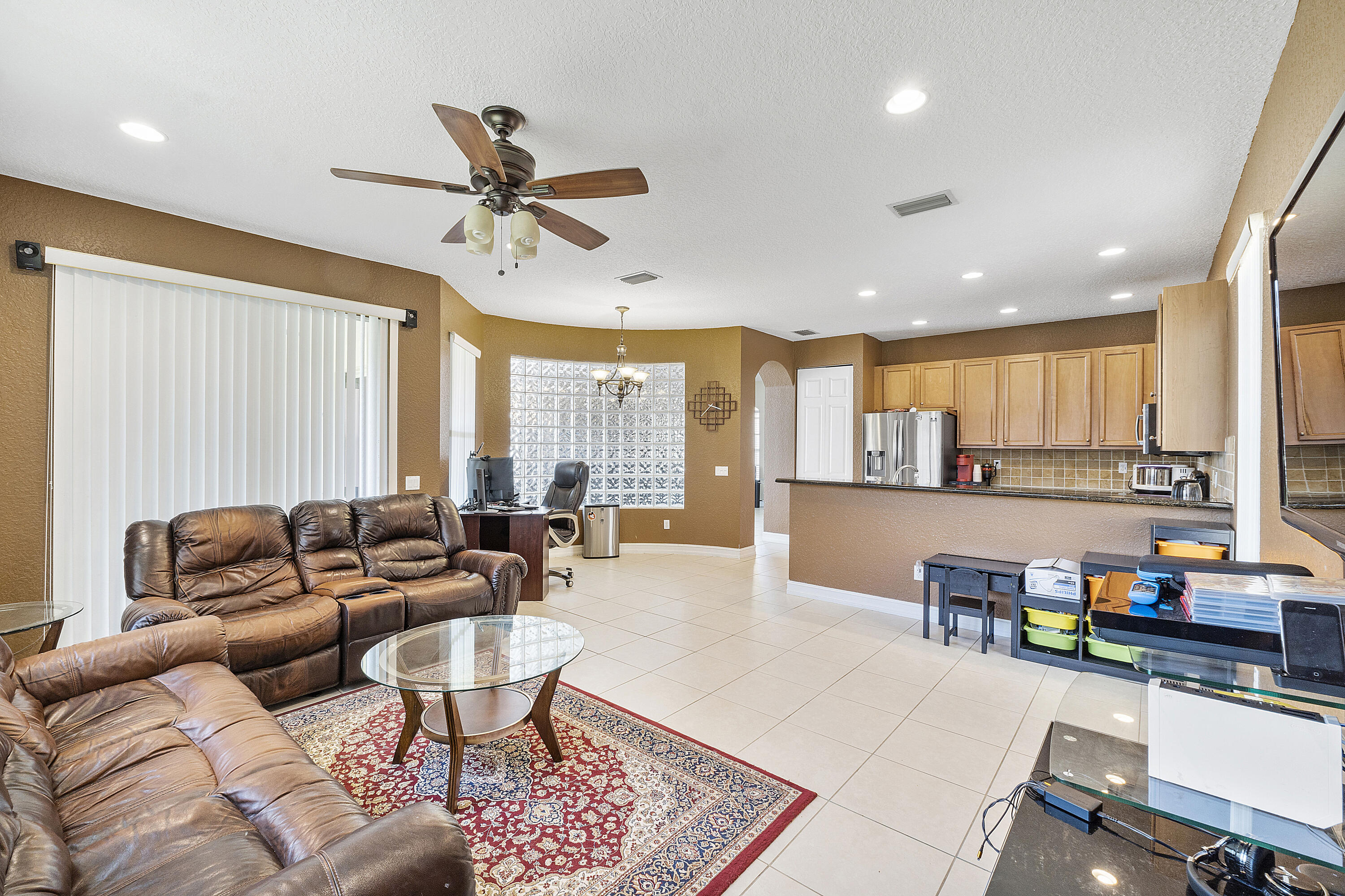 8936 Chestnut Ridge Way Boynton Beach, FL 33473 - Photo 18 of 50 Living Room back towards kitchen
