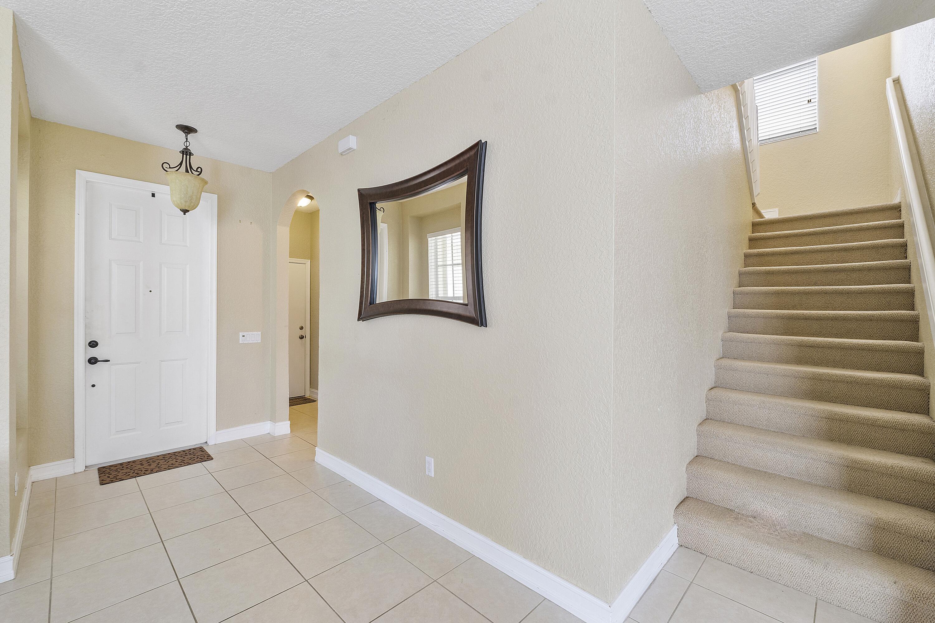 8936 Chestnut Ridge Way Boynton Beach, FL 33473 - Photo 21 of 50 Entry Foyer w stairs
