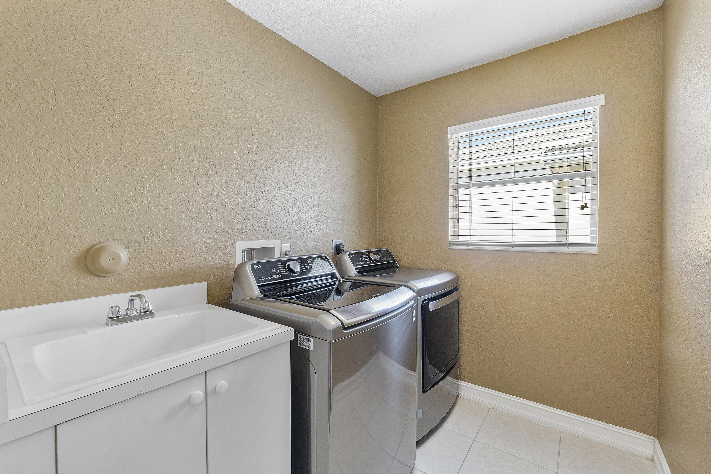 8936 Chestnut Ridge Way Boynton Beach, FL 33473 - Photo 25 of 50 upstairs laundry room