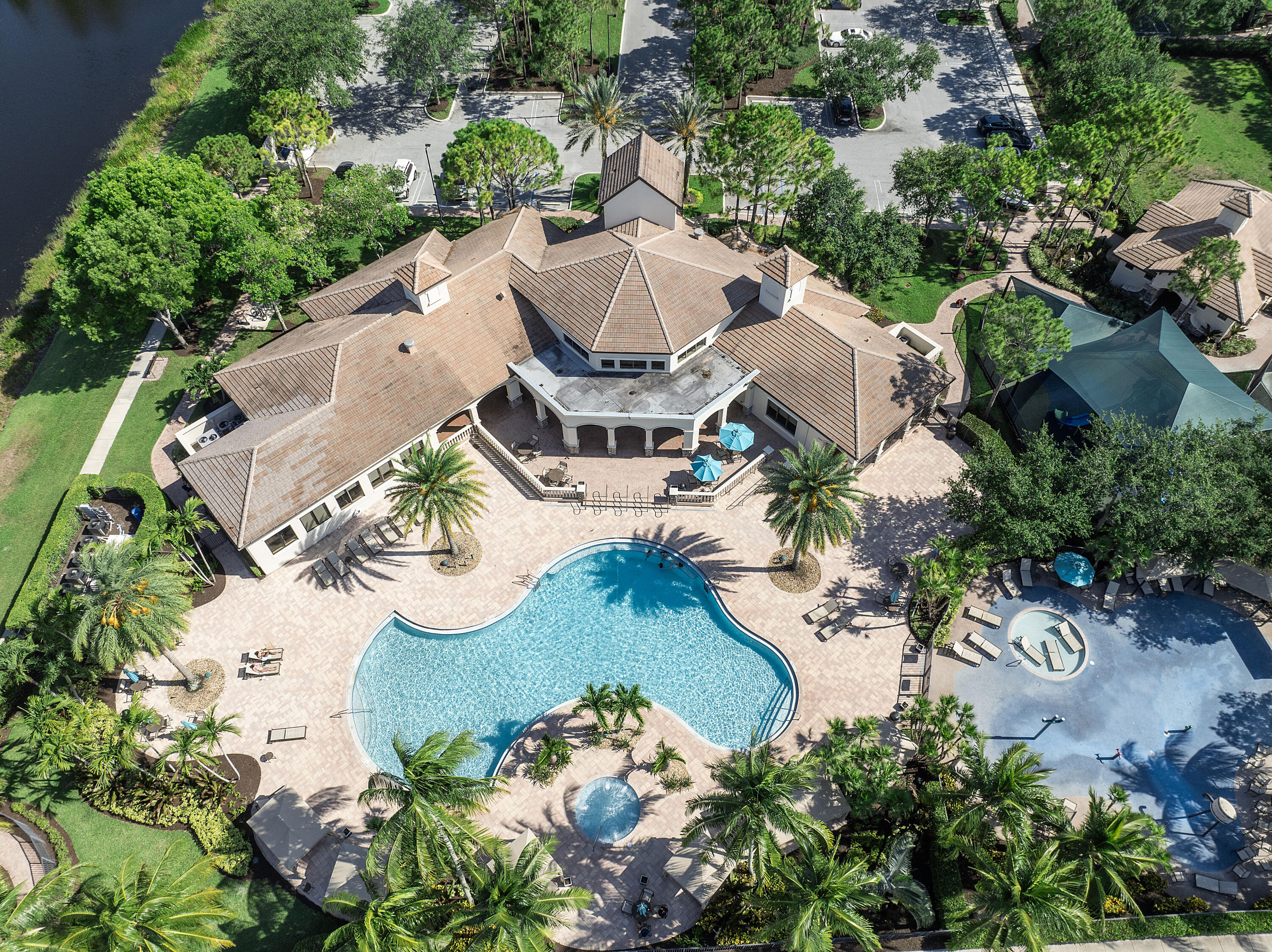8936 Chestnut Ridge Way Boynton Beach, FL 33473 - Photo 39 of 50 Clubhouse Pool and Splashpad