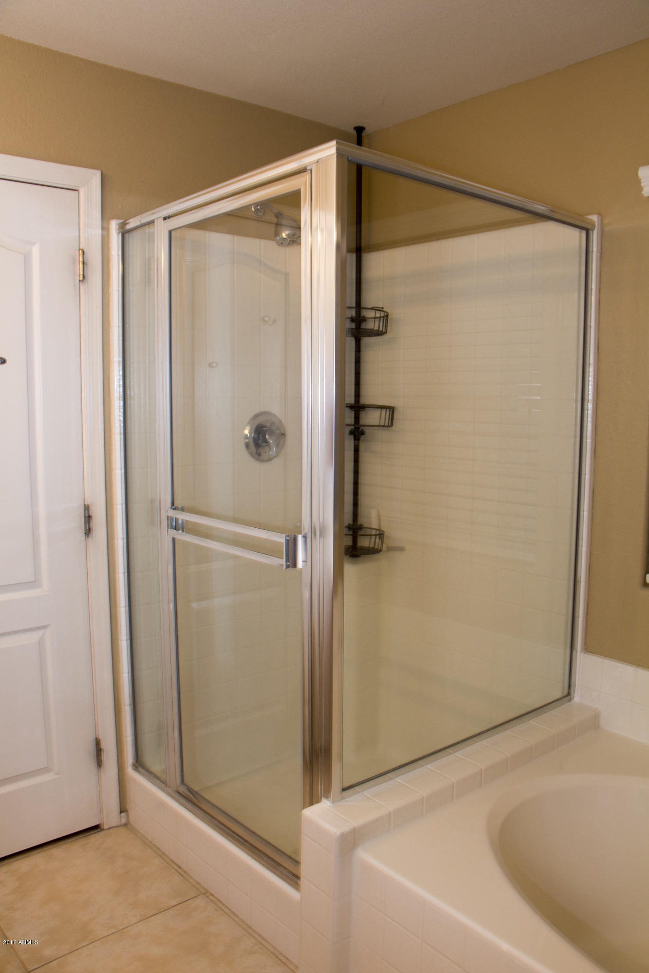 3517 South Sawmill Road Gilbert, AZ 85297 - Photo 19 of 26 a bathroom with a shower and a bath tub